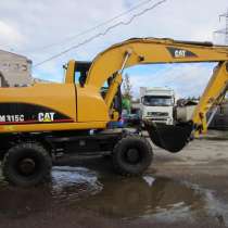 Колесный экскаватор CAT M315C, в Санкт-Петербурге