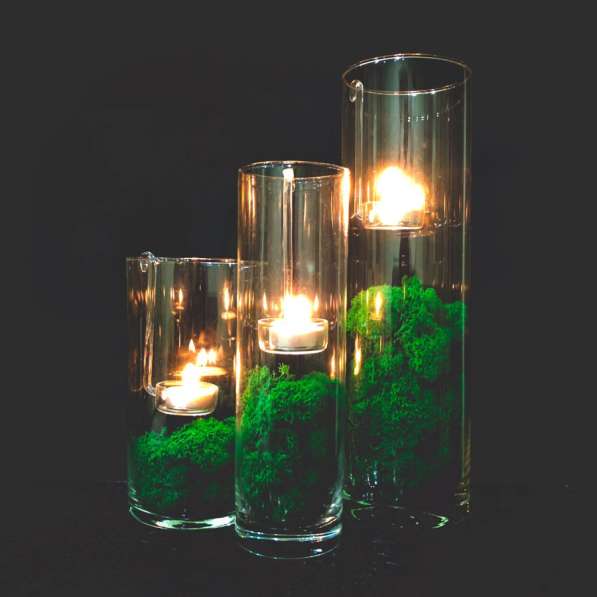 Свечи в стеклянном цилиндре
