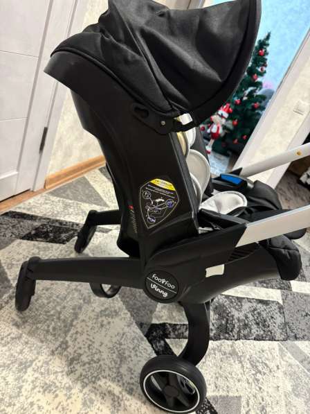 Коляска автолюлька