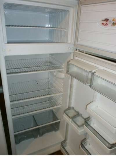 старый холодильник Атлант в Москве
