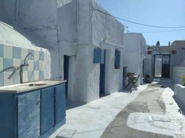 Светлый дом с террасой площадью 150 кв. м. в Греции в фото 5