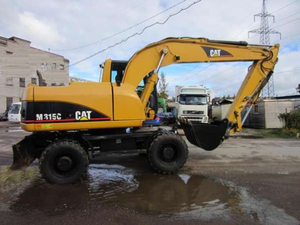 Колесный экскаватор CAT M315C