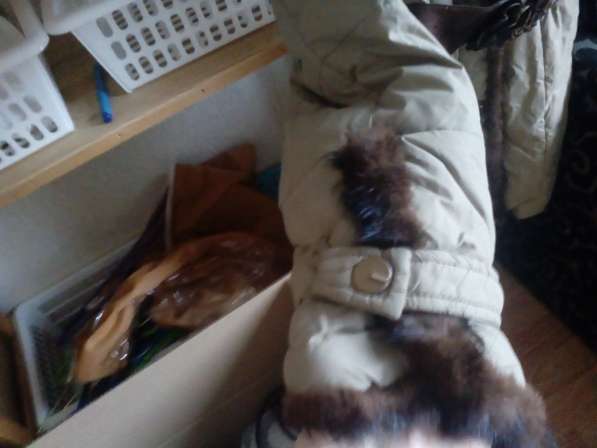 Зимняя куртка пуховик хаки с мехом в Москве фото 3